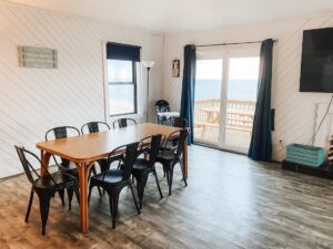 Dining area in oceanfront Outer Banks beach house rental with ocean and beach views