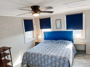 Master bedroom with king bed in OBX oceanfront vacation rental
