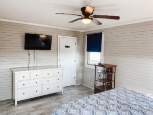 Master bedroom with king bed in OBX oceanfront vacation rental