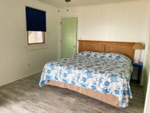 Master bedroom with king bed in OBX oceanfront vacation rental