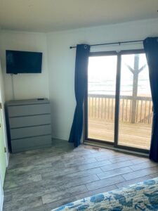 Master bedroom with king bed in OBX oceanfront vacation rental