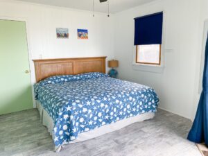 Master bedroom with king bed in OBX oceanfront vacation rental