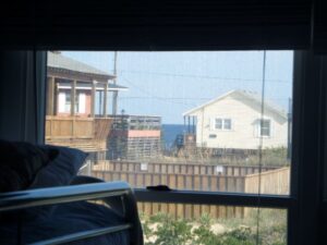 Ocean view from bedroom of OBX beach house rental