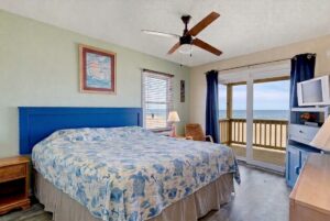 Master bedroom with king bed in OBX oceanfront vacation rental
