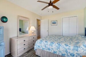 Master bedroom with king bed in OBX oceanfront vacation rental