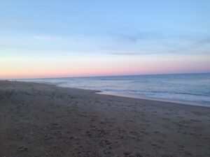 Sandy shoreline steps from OBX beach house